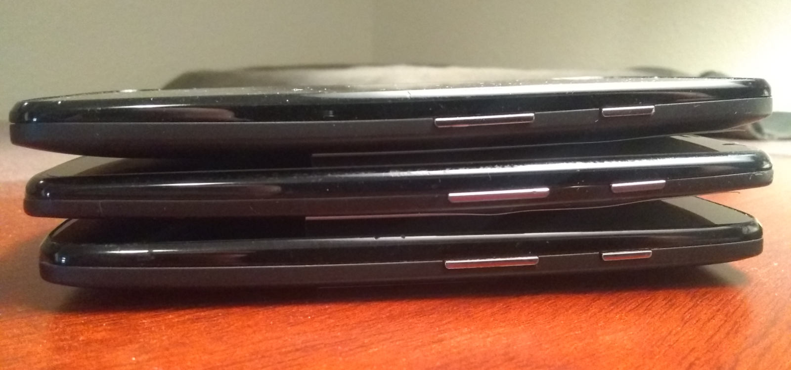 Stack of three different Moto phones